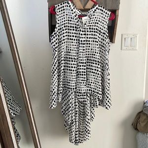 Blouse with short front and long dress like back